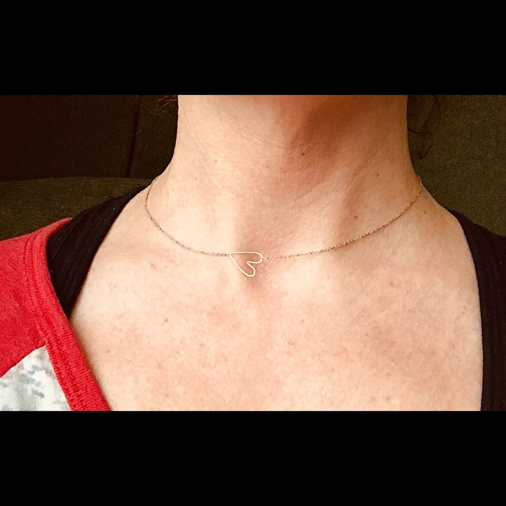 Zoe Chicco silver sideways heart necklace.
